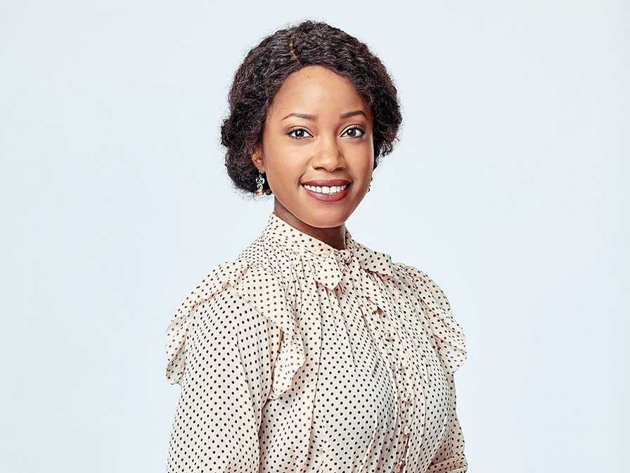 Natasha Burnett como Minnie Canfield