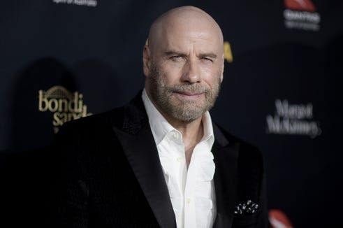 John Travolta prévoit de garder le regard chauve, dit-il _ se sent bien_